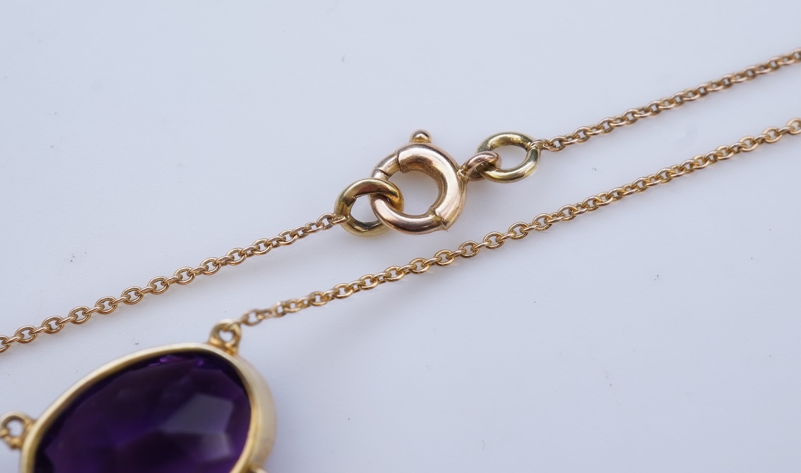 An Edwardian amethyst and seed pearl pendant, circa 1910